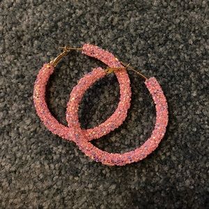 pink glittered hoop earrings